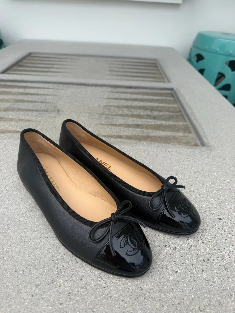 CHANEL Black Leather Cap-Toe Bow Ballet Flats